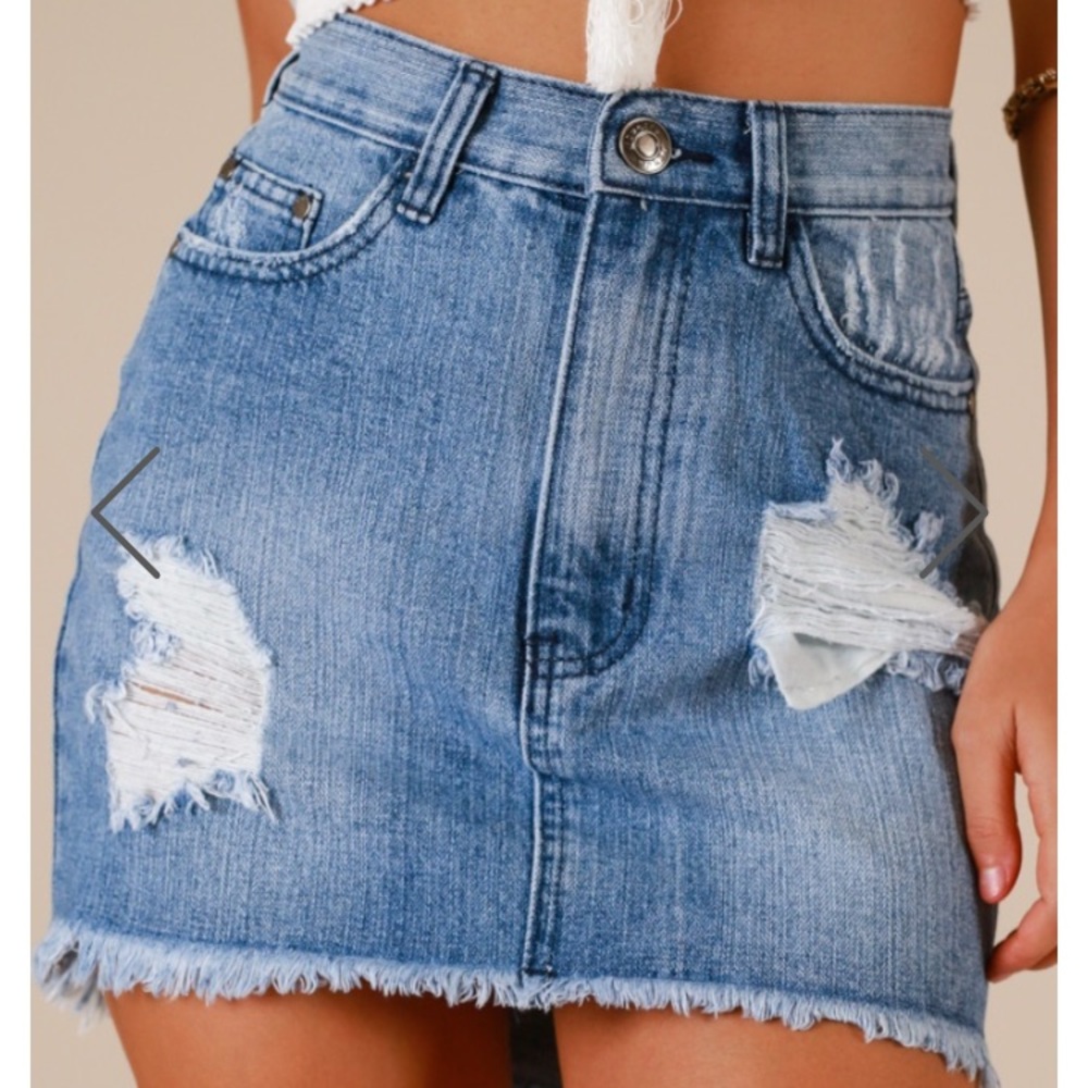 a denim distressed skirt